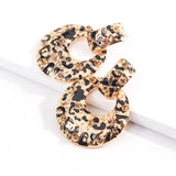 boucles d'oreilles dore leopard