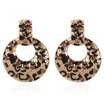 boucles d'oreilles dorees leopard