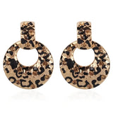 boucles d'oreilles dorees leopard